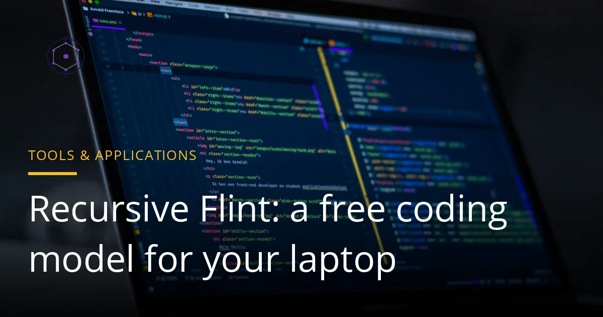 A MacBook Pro on a desk showing colourful source code in a code editor